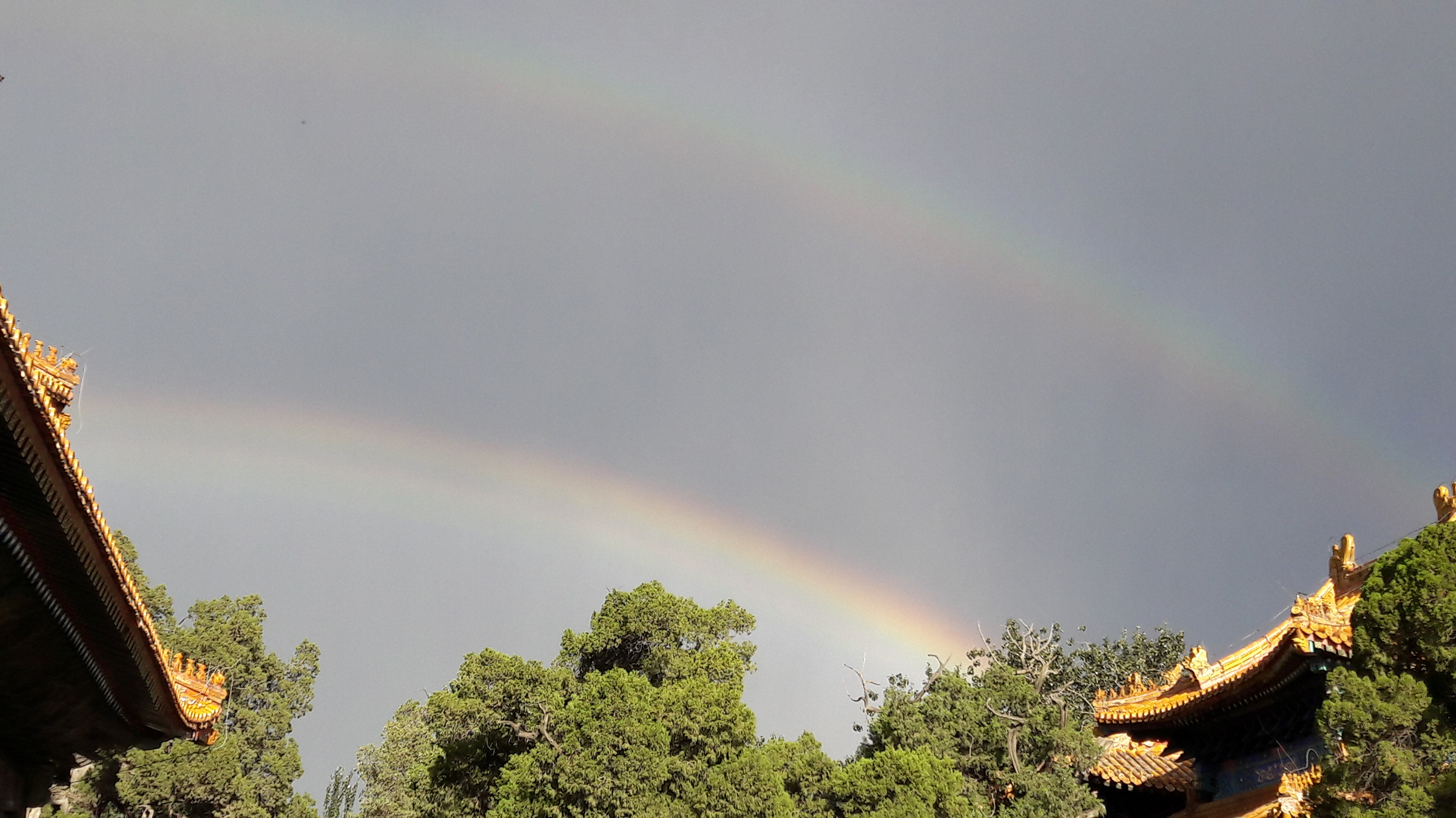 A wonderful rainbow over Beijing's Confucius Temple, 2016.